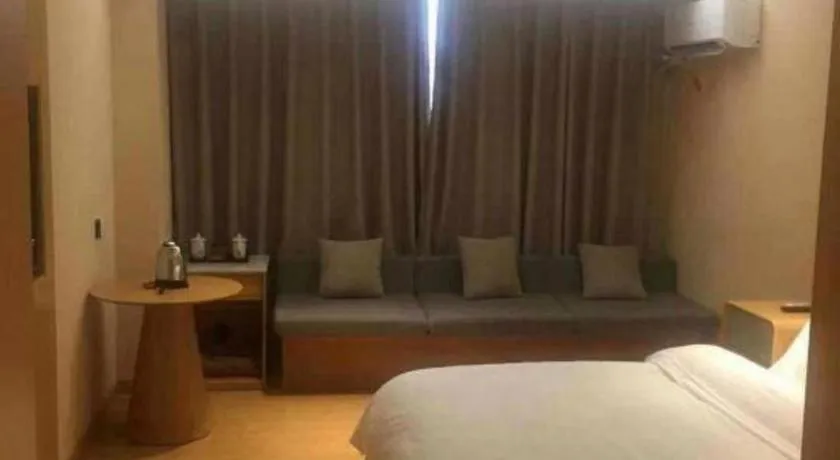Bed in Pankun Business Hotel