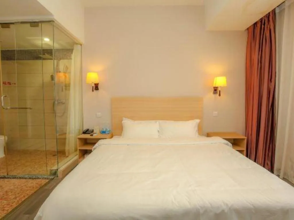 Bed in Pankun Business Hotel