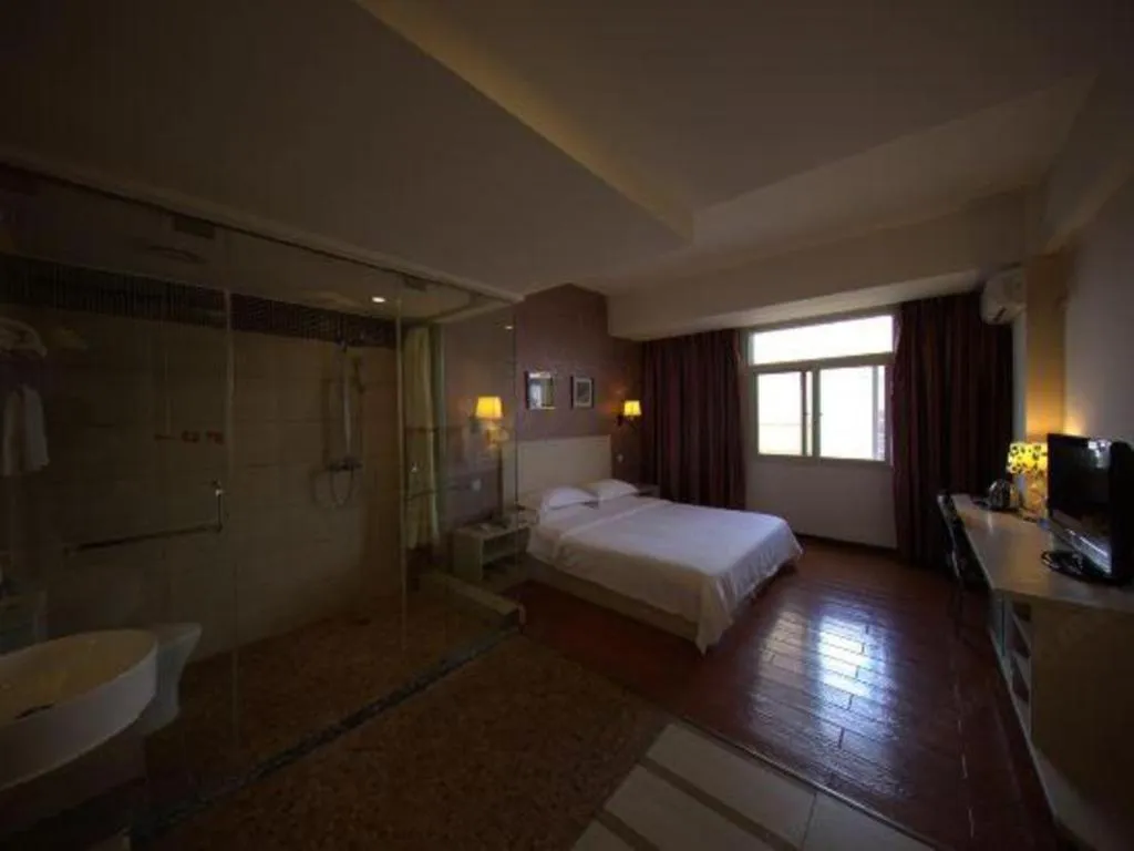 Bed in Pankun Business Hotel