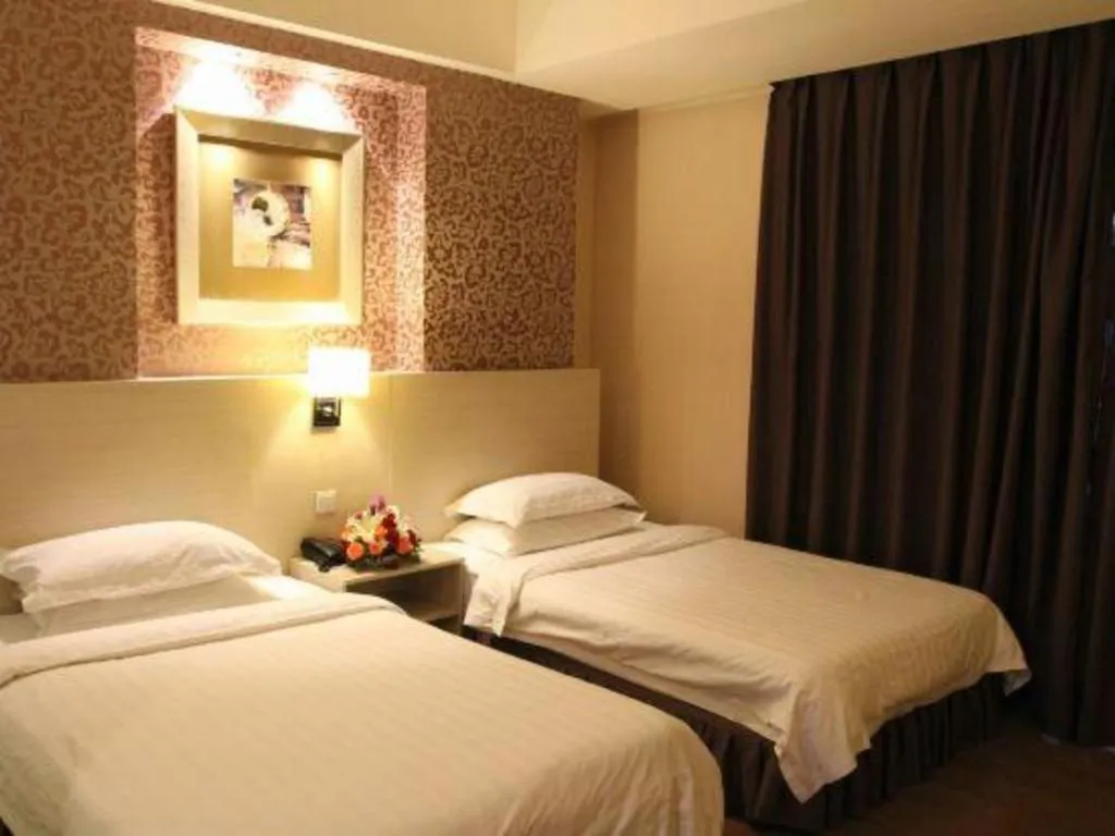 Bed in Pankun Business Hotel