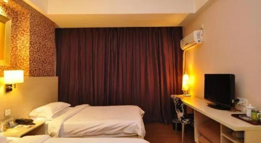 Bed in Pankun Business Hotel