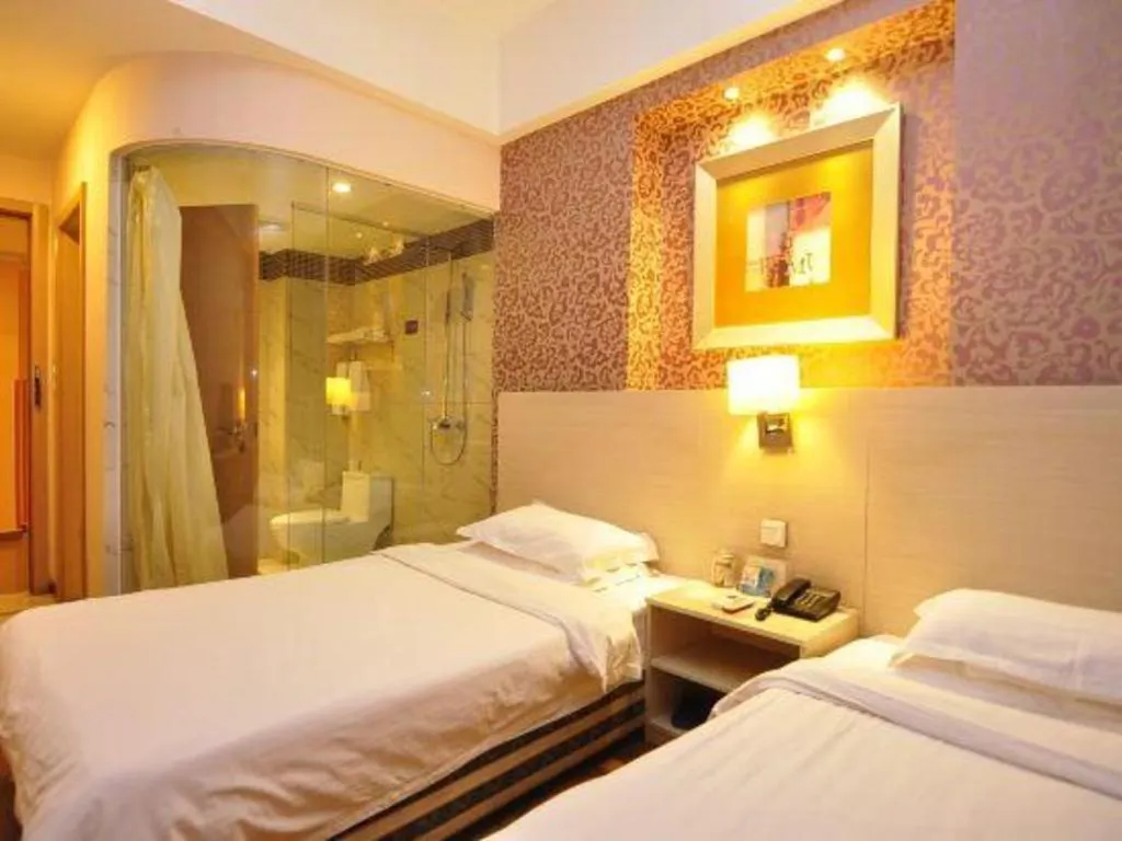 Bed in Pankun Business Hotel