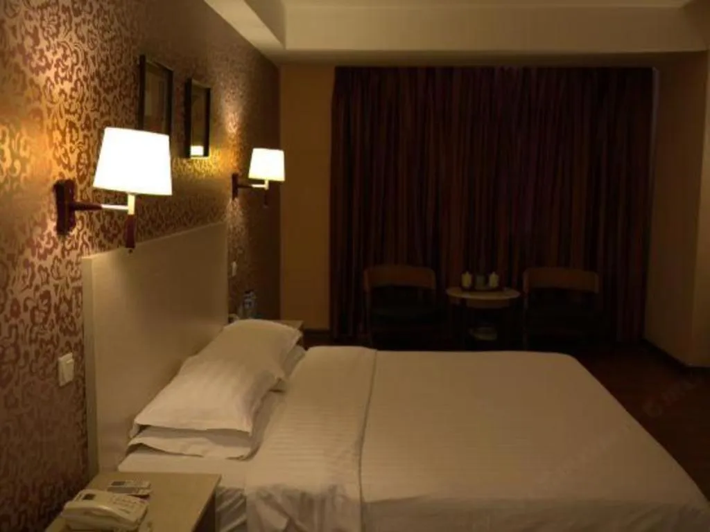 Bed in Pankun Business Hotel