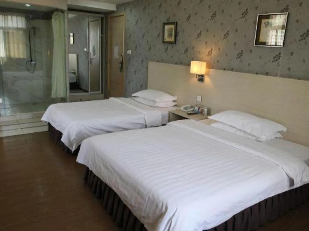 Bed in Pankun Business Hotel