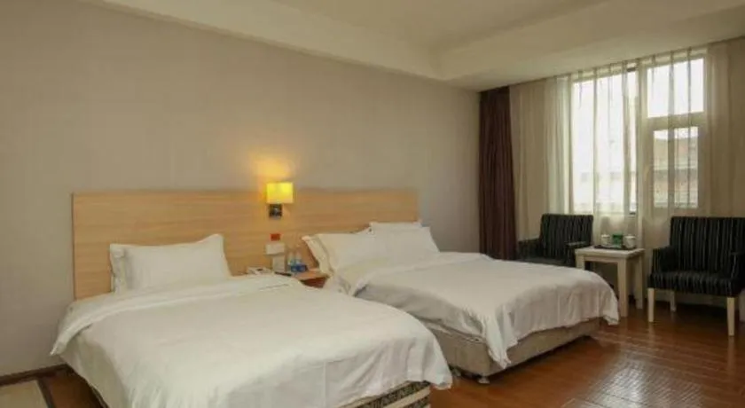 Bed in Pankun Business Hotel