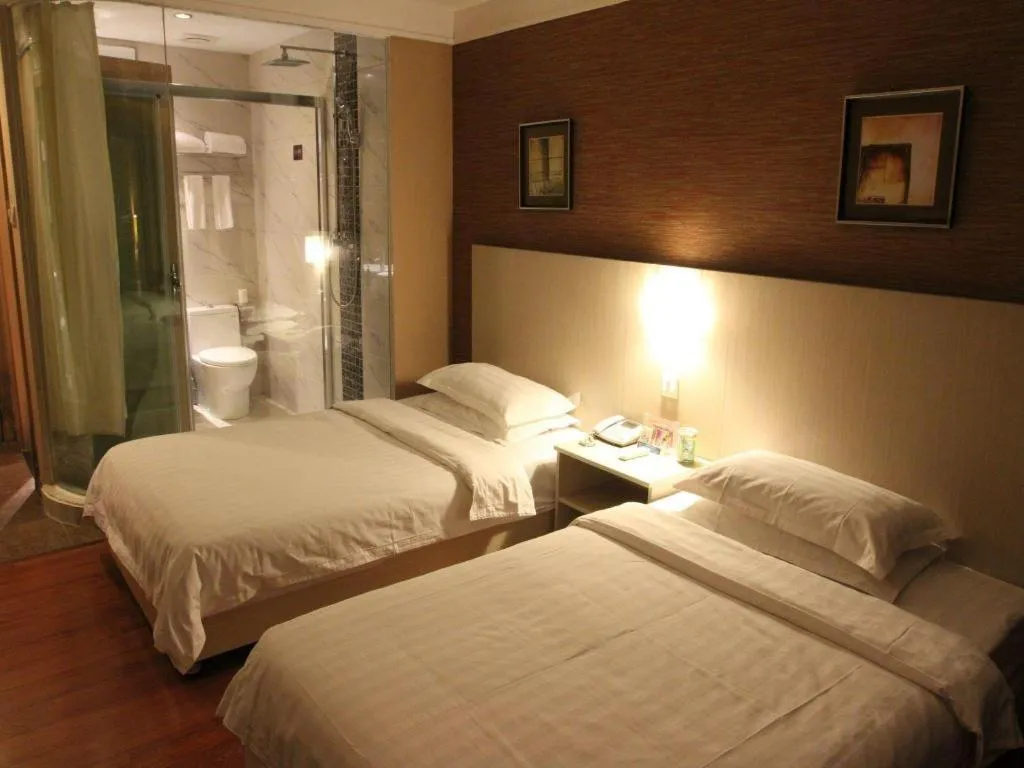 Bed in Pankun Business Hotel