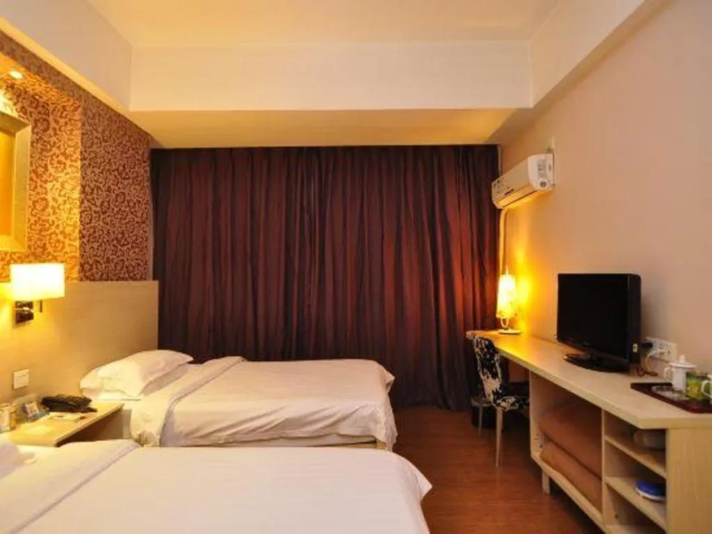 Bed in Pankun Business Hotel