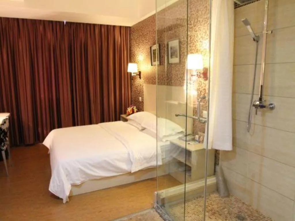 Bed in Pankun Business Hotel