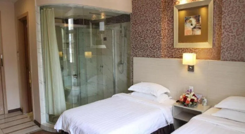 Bed in Pankun Business Hotel