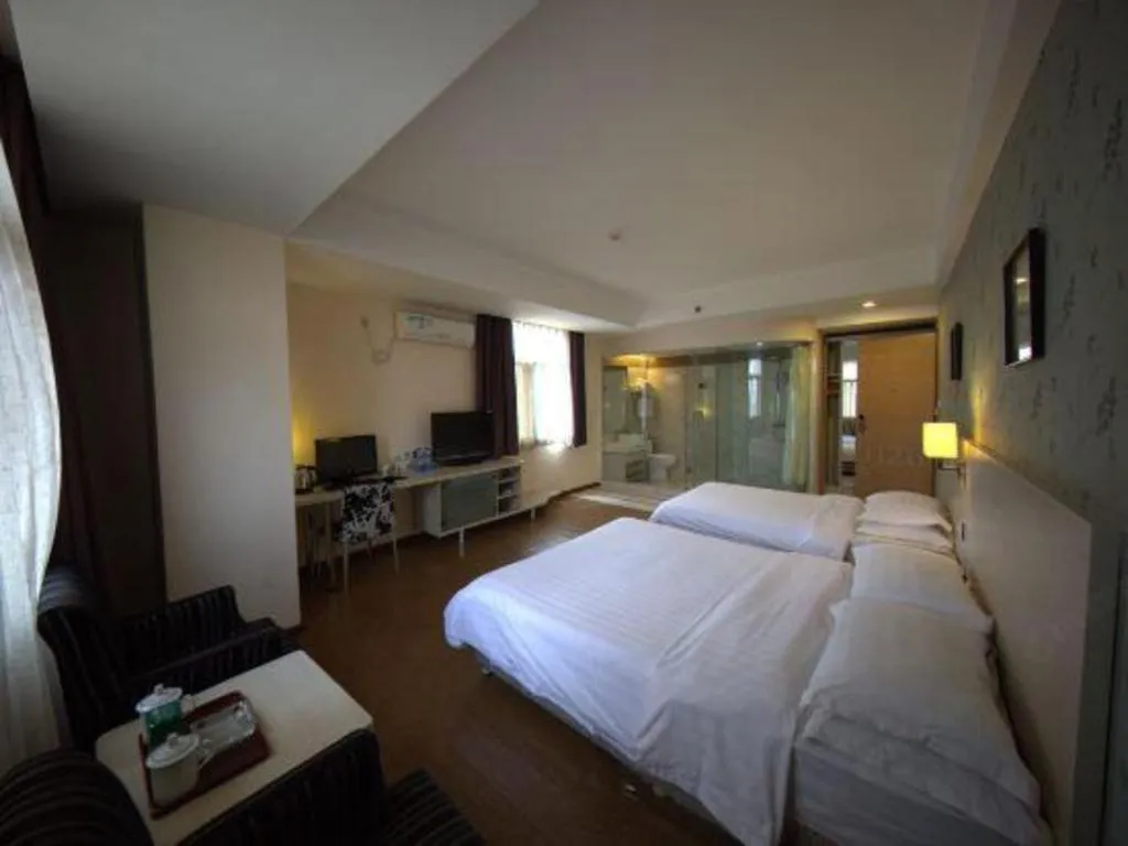 Bed in Pankun Business Hotel