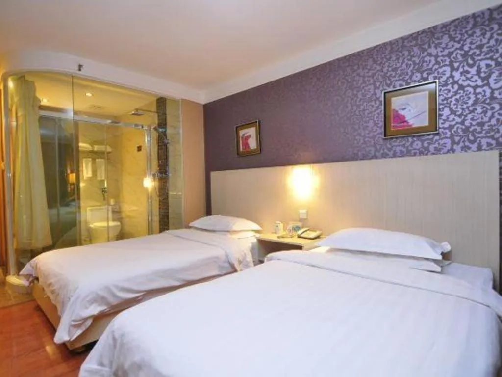 Bed in Pankun Business Hotel