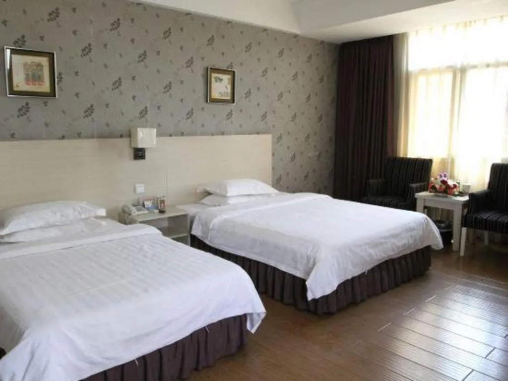 Bed in Pankun Business Hotel