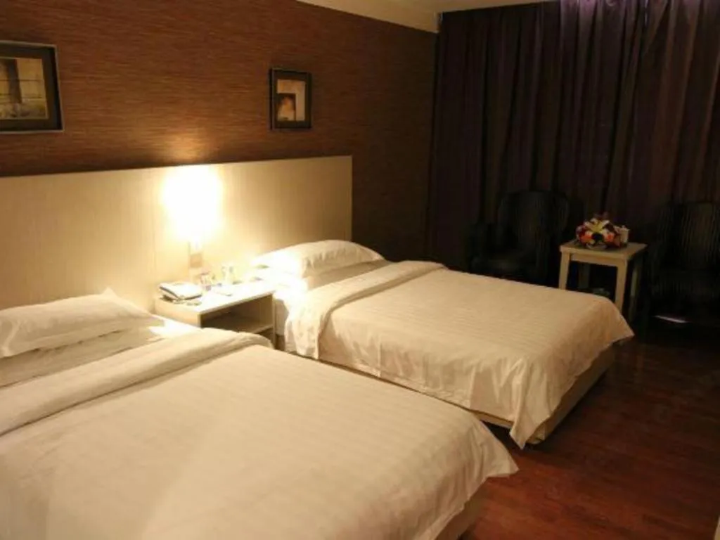 Bed in Pankun Business Hotel