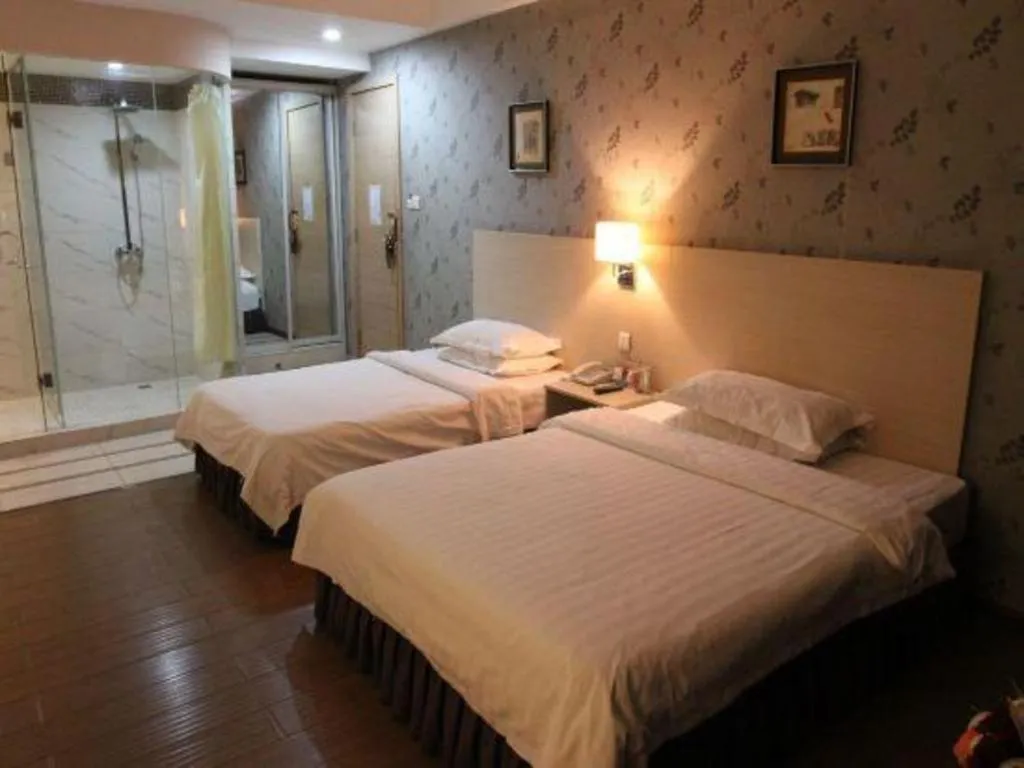 Bed in Pankun Business Hotel