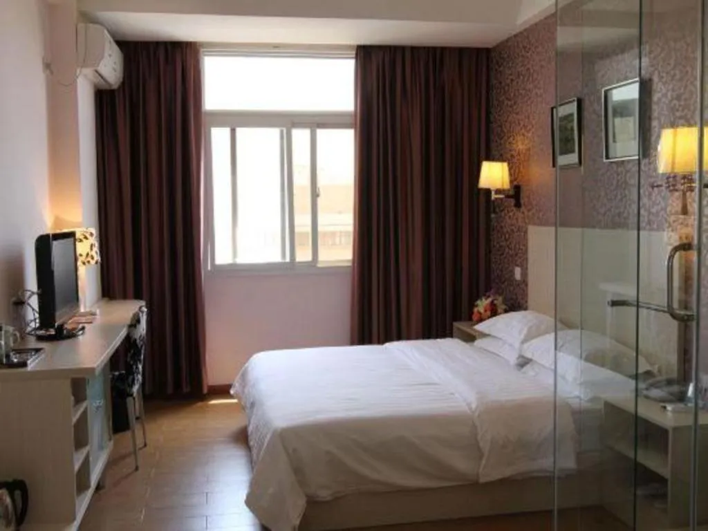 Bed in Pankun Business Hotel