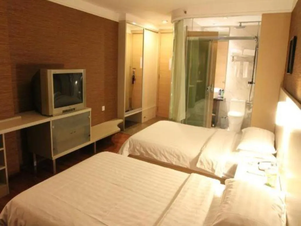 Bed in Pankun Business Hotel