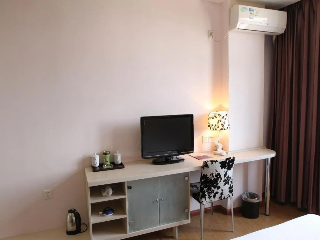 Bed in Pankun Business Hotel