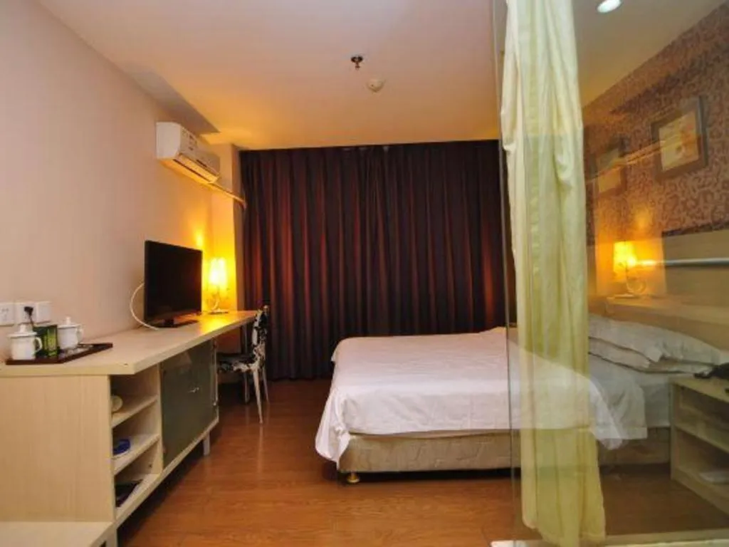 Bed in Pankun Business Hotel