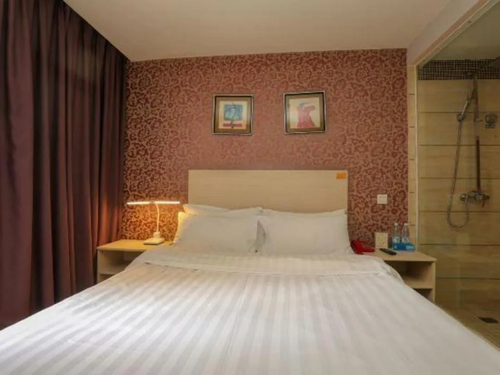 Bed in Pankun Business Hotel