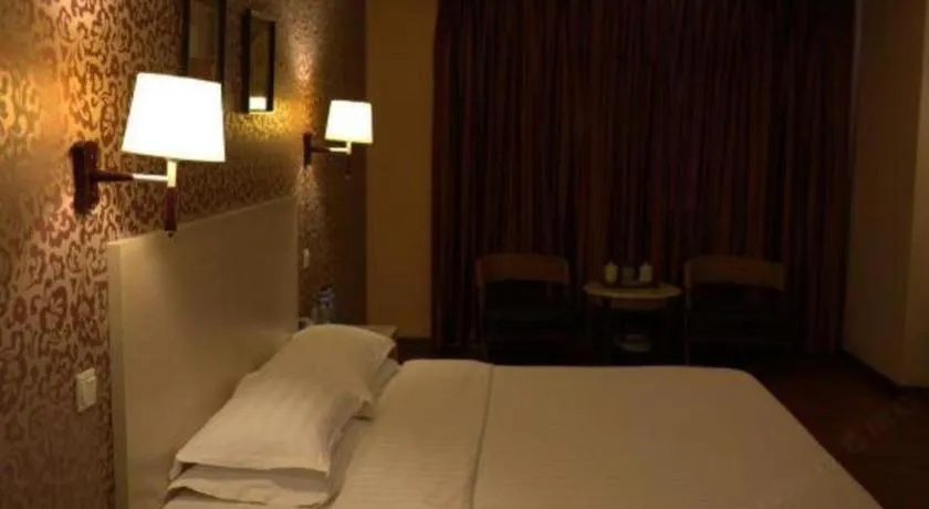 Bed in Pankun Business Hotel