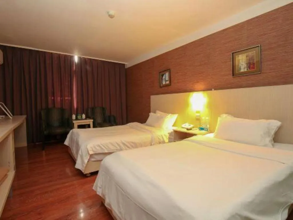 Bed in Pankun Business Hotel