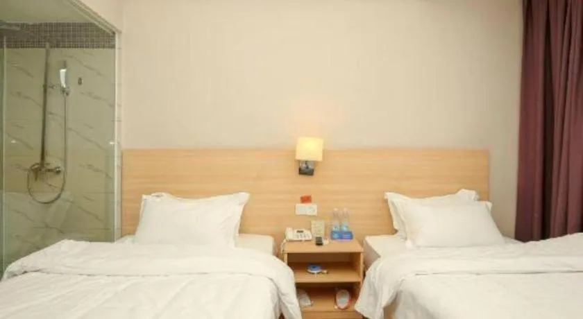 Bed in Pankun Business Hotel