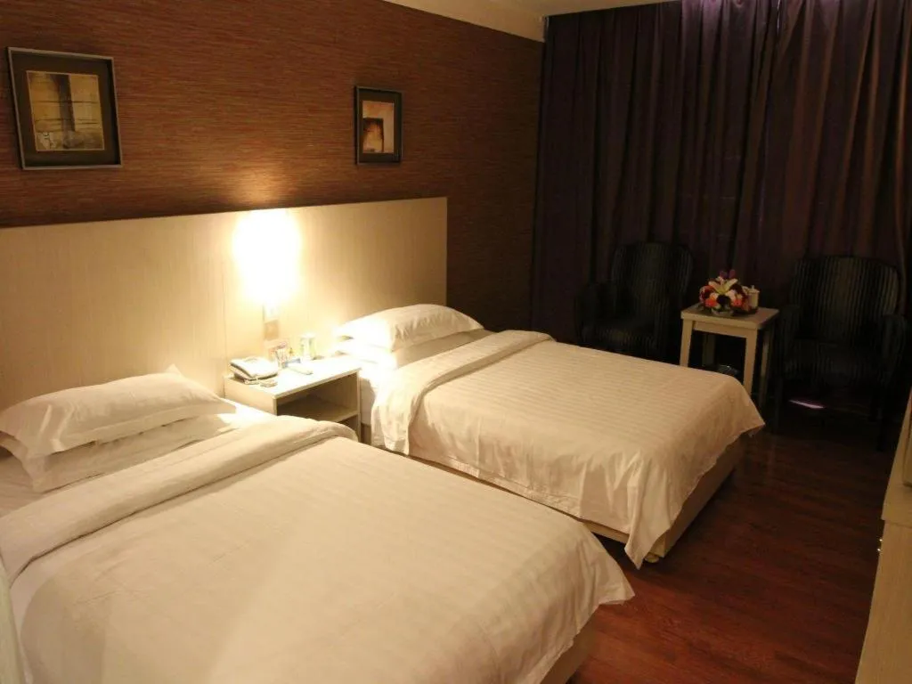 Bed in Pankun Business Hotel