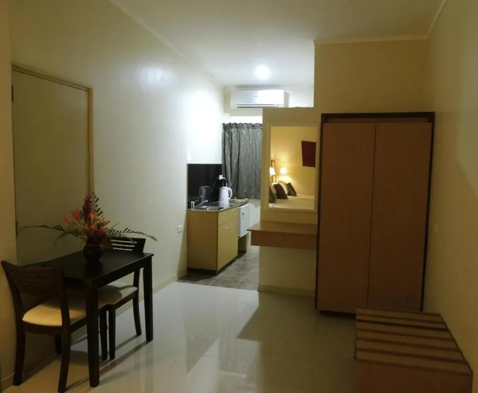 Bed in Victoria Palms Hotel