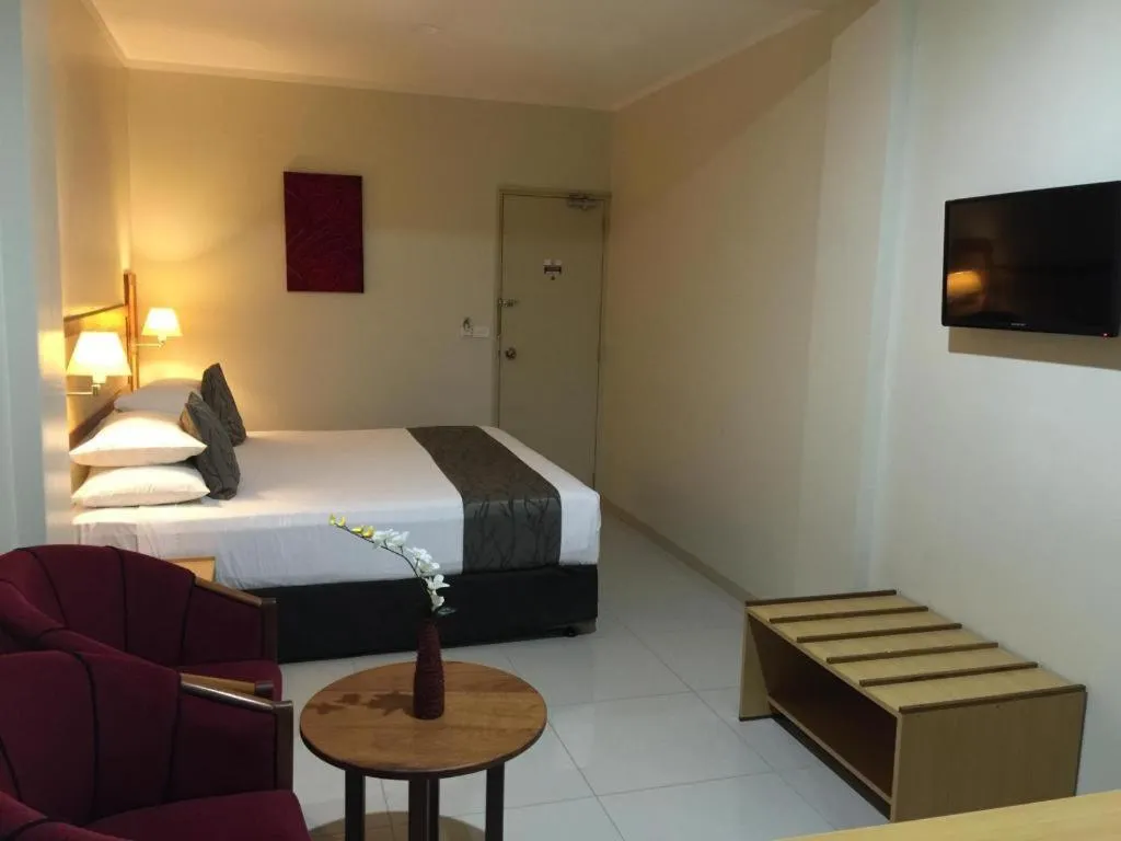 Bed in Victoria Palms Hotel