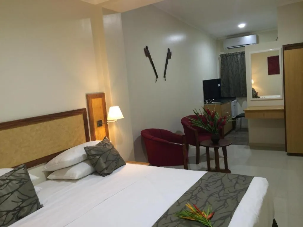 Bed in Victoria Palms Hotel