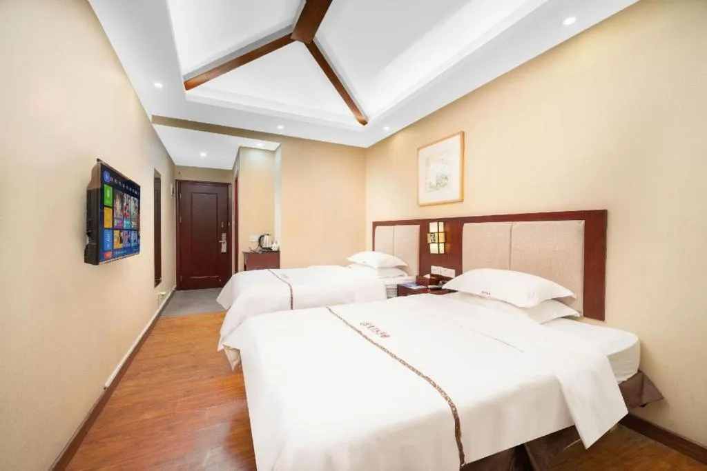 Bed in BOOK PAVILION HOTEL