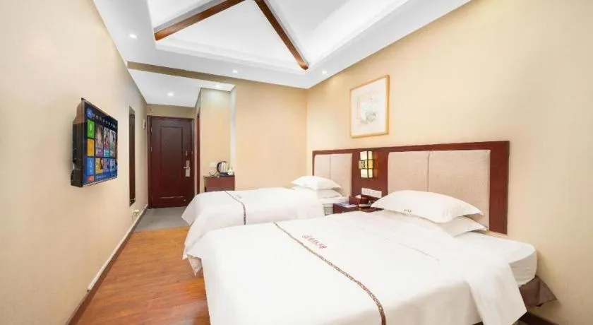 Bed in BOOK PAVILION HOTEL