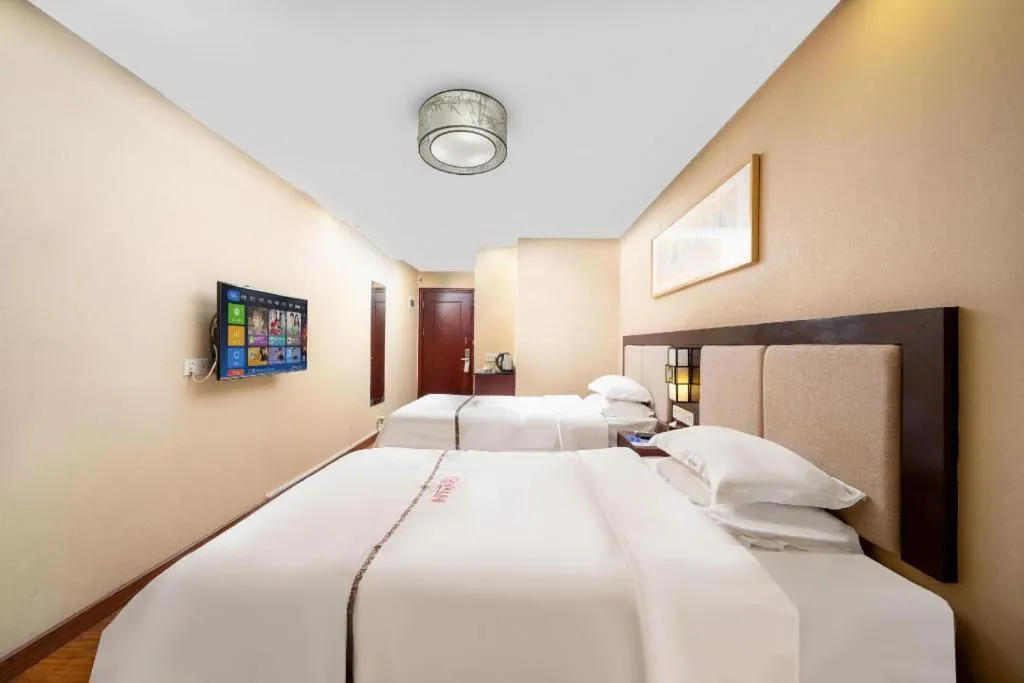 Bed in BOOK PAVILION HOTEL