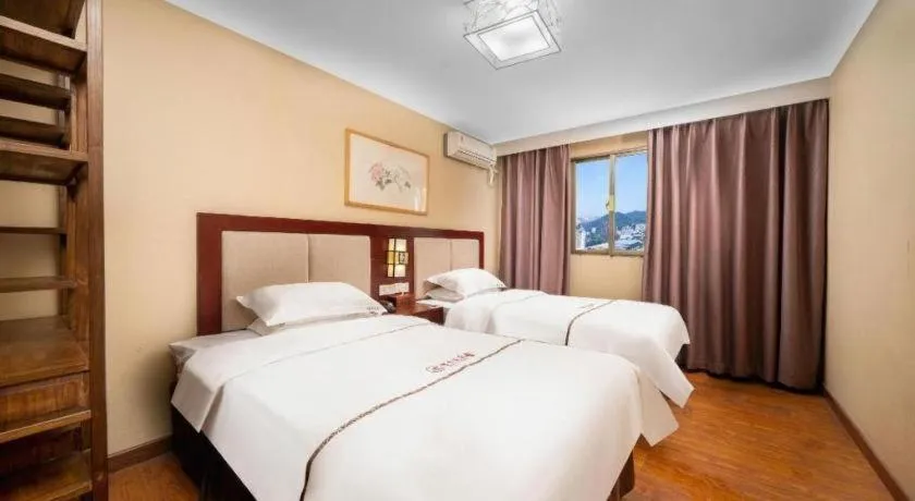 Bed in BOOK PAVILION HOTEL