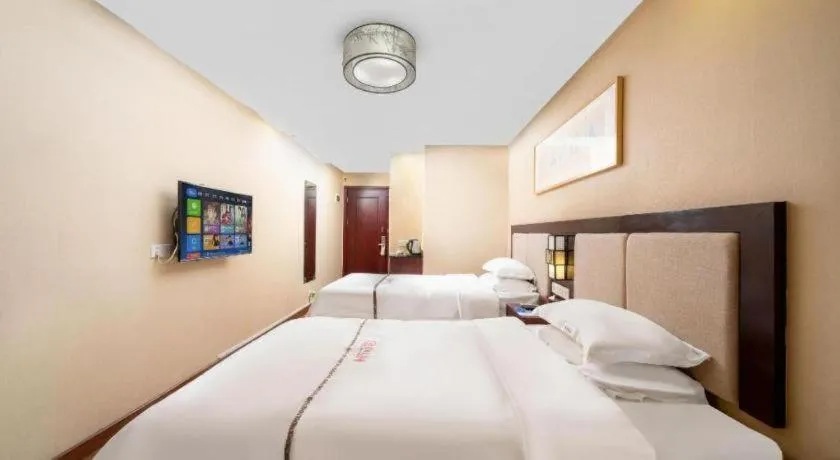 Bed in BOOK PAVILION HOTEL