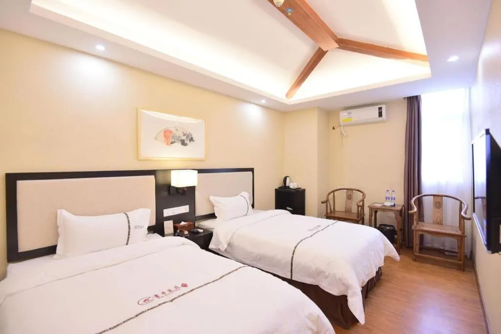 Bed in BOOK PAVILION HOTEL