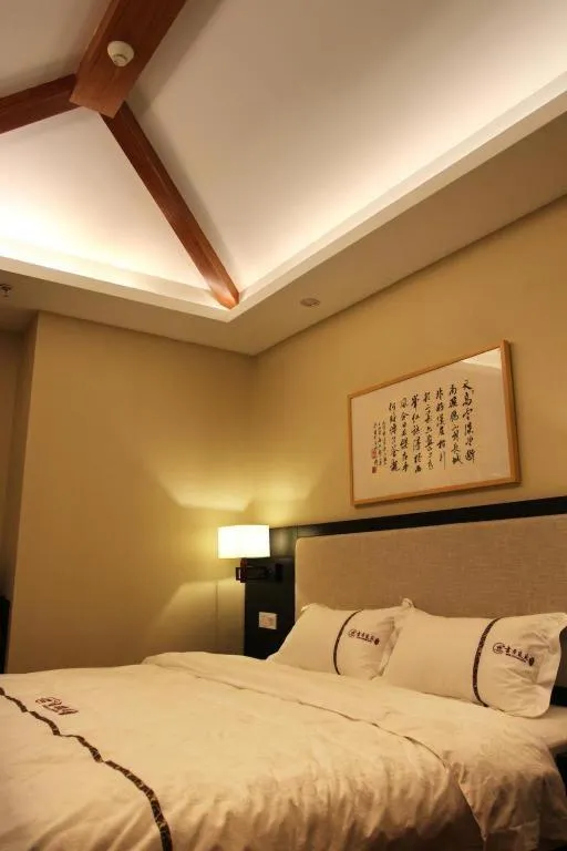 Bed in BOOK PAVILION HOTEL