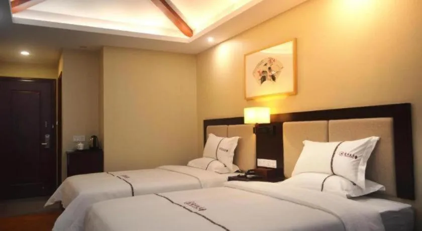 Bed in BOOK PAVILION HOTEL