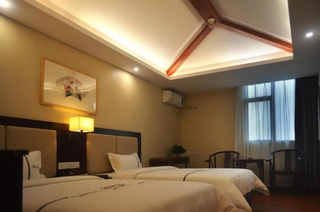 Bed in BOOK PAVILION HOTEL