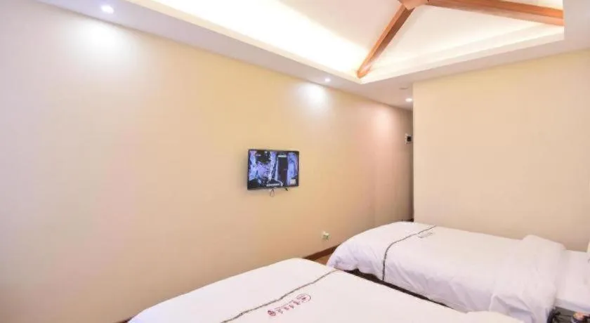 Bed in BOOK PAVILION HOTEL