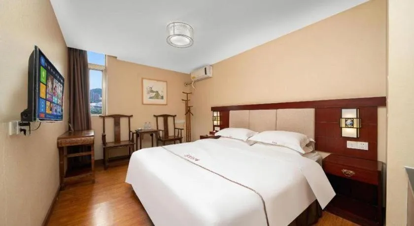 Bed in BOOK PAVILION HOTEL