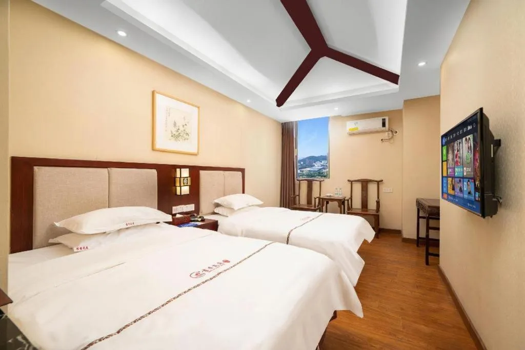 Bed in BOOK PAVILION HOTEL