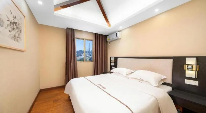 Bed in BOOK PAVILION HOTEL