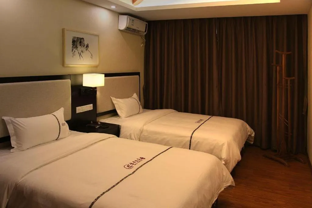 Bed in BOOK PAVILION HOTEL