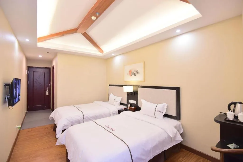 Bed in BOOK PAVILION HOTEL