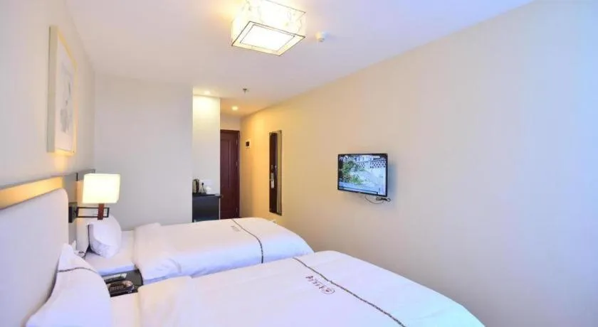 Bed in BOOK PAVILION HOTEL