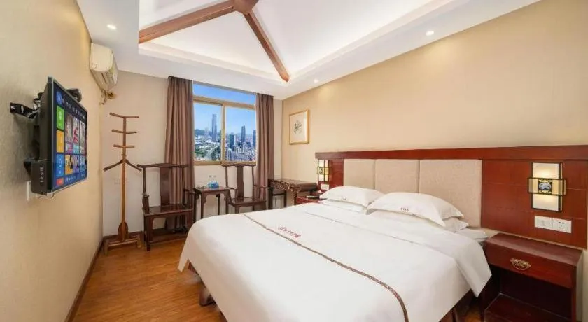 Bed in BOOK PAVILION HOTEL