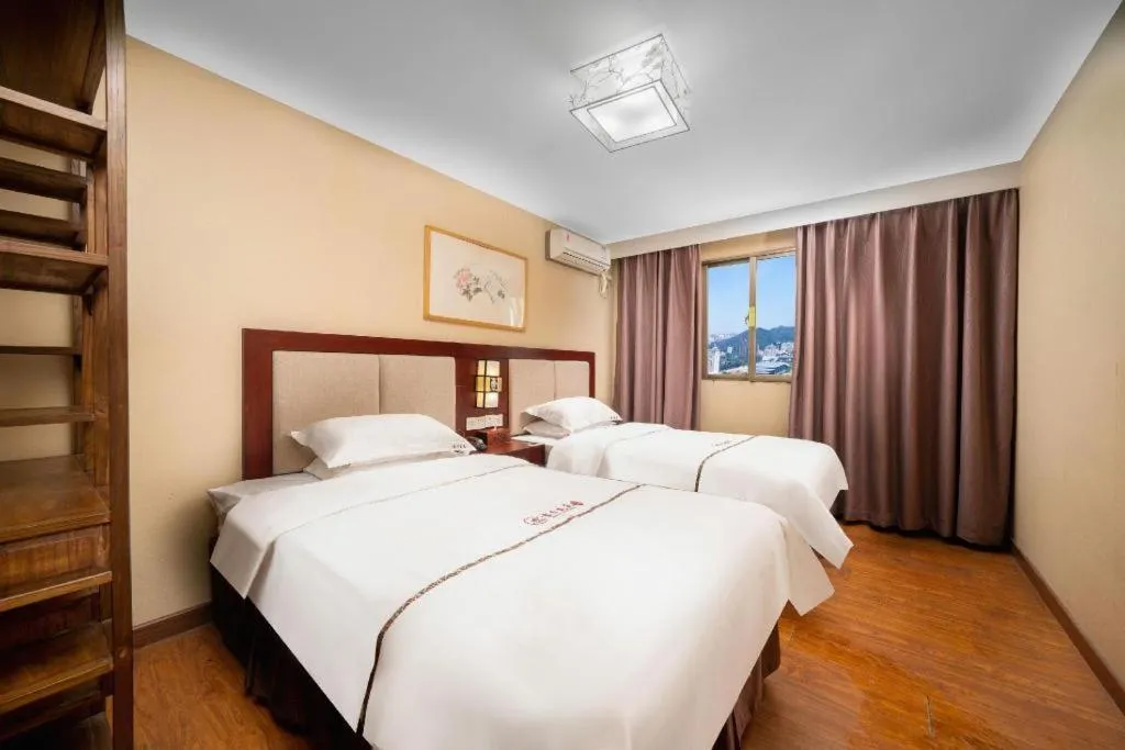 Bed in BOOK PAVILION HOTEL