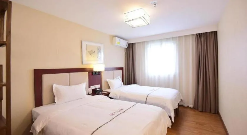 Bed in BOOK PAVILION HOTEL