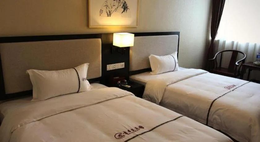 Bed in BOOK PAVILION HOTEL